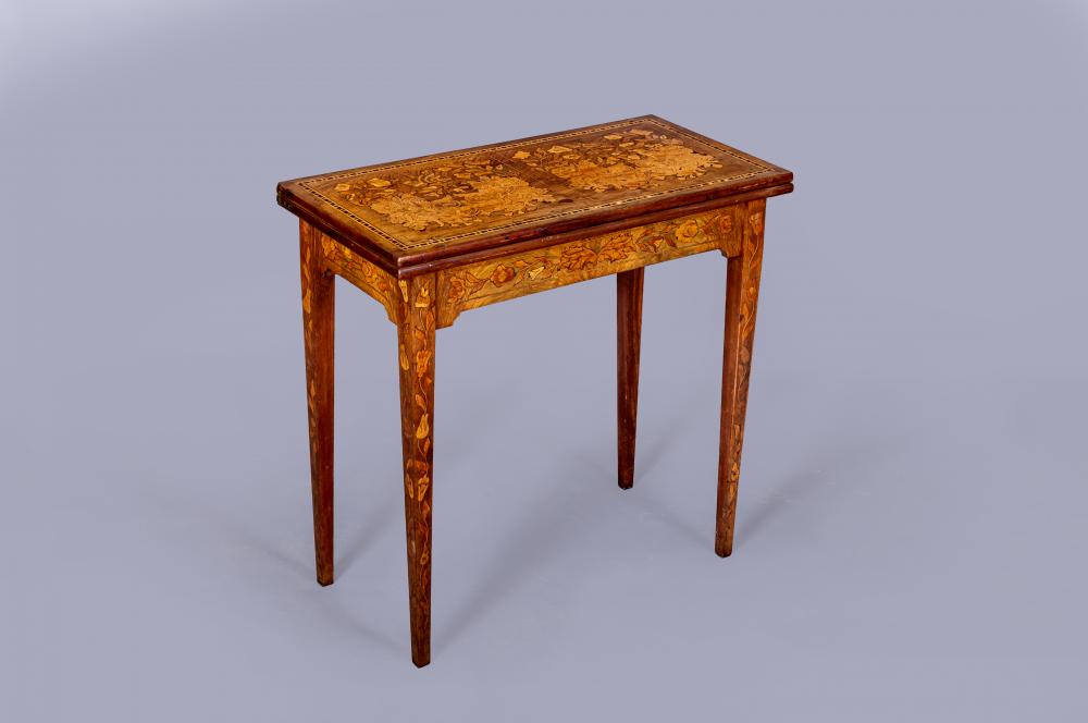 A DUTCH WALNUT AND MARQUETRY FOLDING CARD TABLE Image
