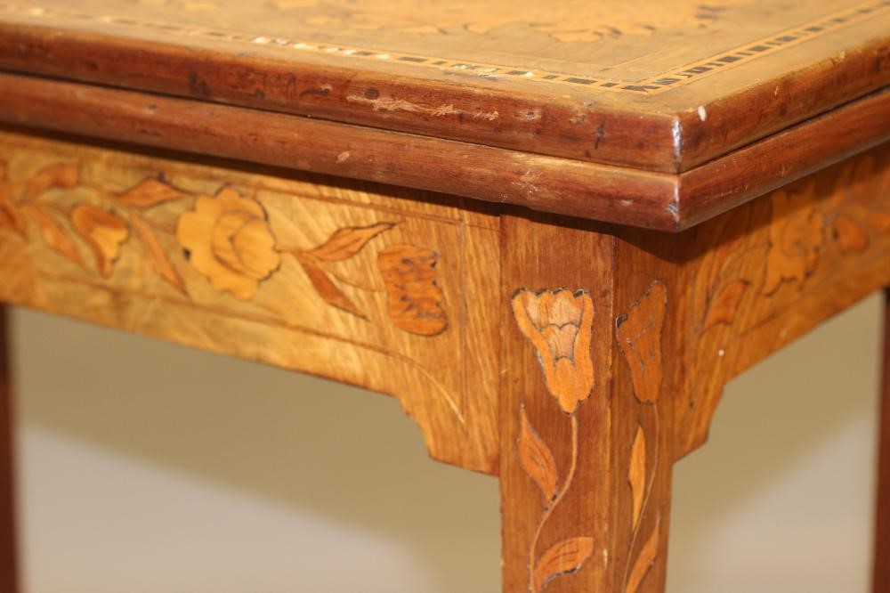 A DUTCH WALNUT AND MARQUETRY FOLDING CARD TABLE Image