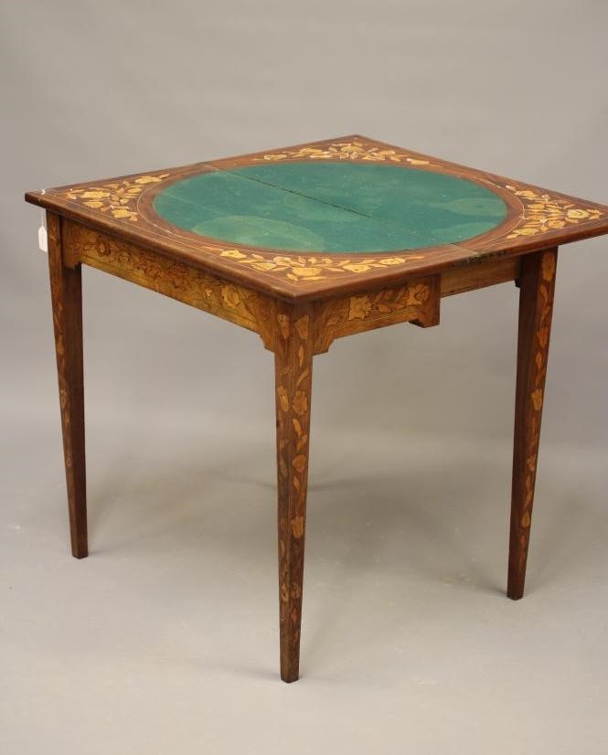 A DUTCH WALNUT AND MARQUETRY FOLDING CARD TABLE Image