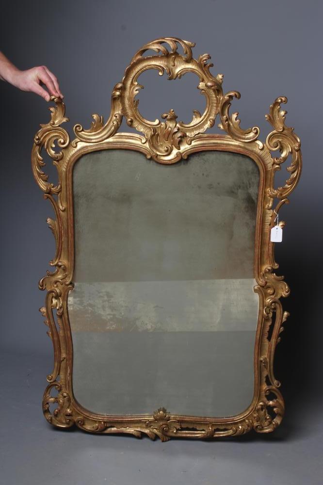 A MID GEORGIAN STYLE GILT WOOD PIER GLASS, 20th century, in the rococo taste, the oblong plate Image