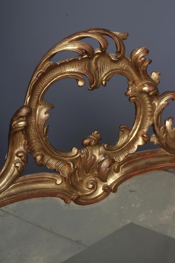 A MID GEORGIAN STYLE GILT WOOD PIER GLASS, 20th century, in the rococo taste, the oblong plate Image