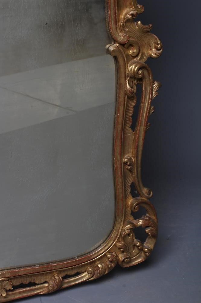 A MID GEORGIAN STYLE GILT WOOD PIER GLASS, 20th century, in the rococo taste, the oblong plate Image
