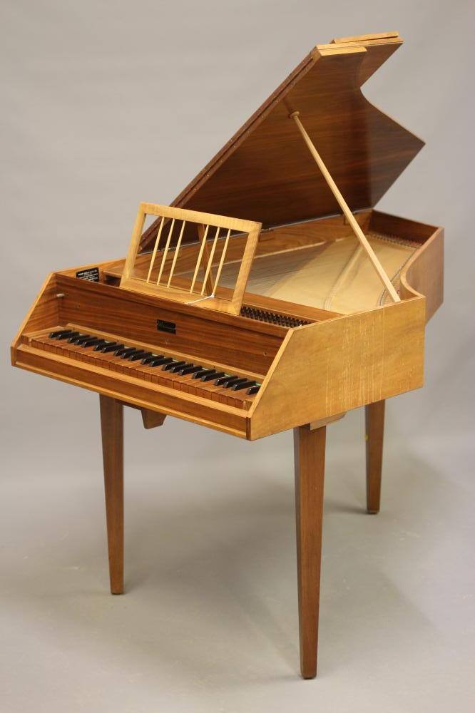 A WITTMAYER HARPSICHORD, modern, housed in a walnut case, raised on square tapering legs, a label Image