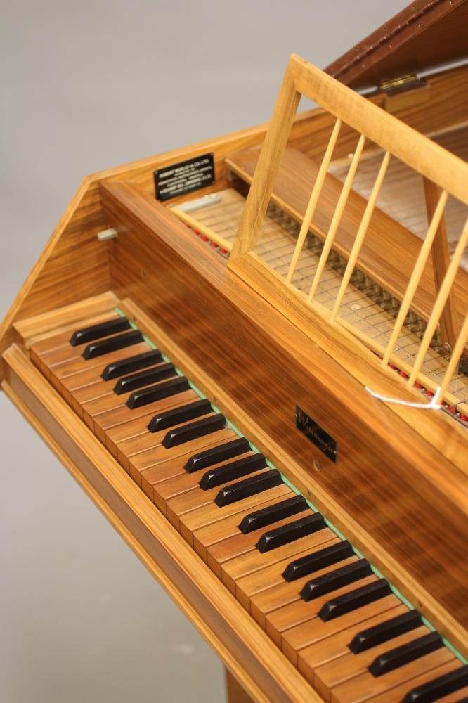 A WITTMAYER HARPSICHORD, modern, housed in a walnut case, raised on square tapering legs, a label Image