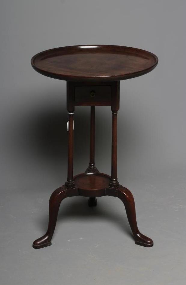 A MAHOGANY OCCASIONAL TABLE, the circular top on associated triangular base with turned supports and Image