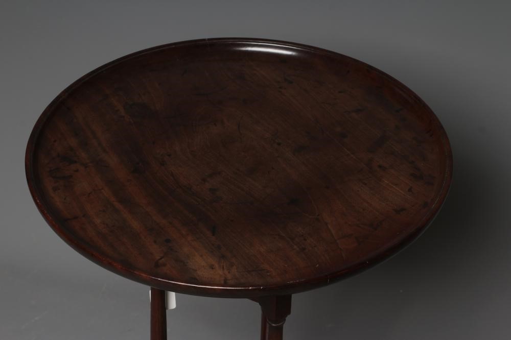 A MAHOGANY OCCASIONAL TABLE, the circular top on associated triangular base with turned supports and Image
