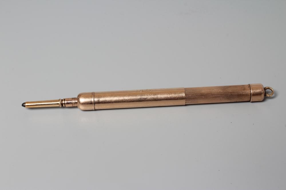 A LATE VICTORIAN TIFFANY & CO. GOLD PROPELLING PENCIL with fixed hanging loop, engraved 'DP JA to Image