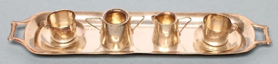 AN EDWARDIAN SILVER MINIATURE TETE-A-TETE Image