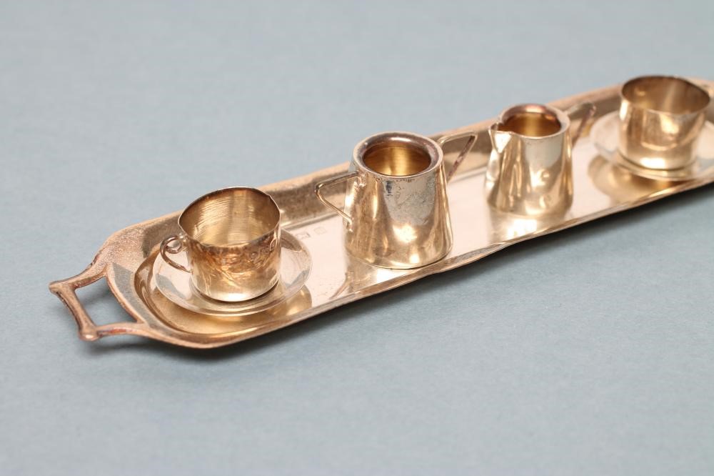 AN EDWARDIAN SILVER MINIATURE TETE-A-TETE Image