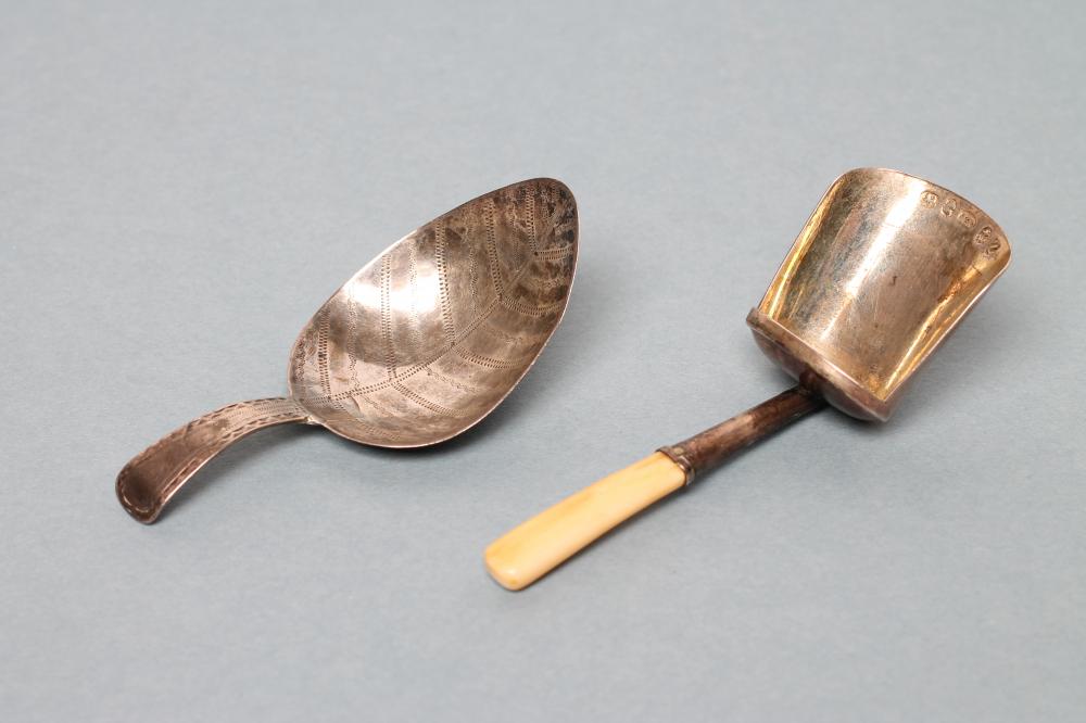A LATE GEORGE III SILVER CADDY SPOON Image