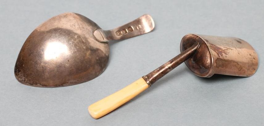 A LATE GEORGE III SILVER CADDY SPOON Image