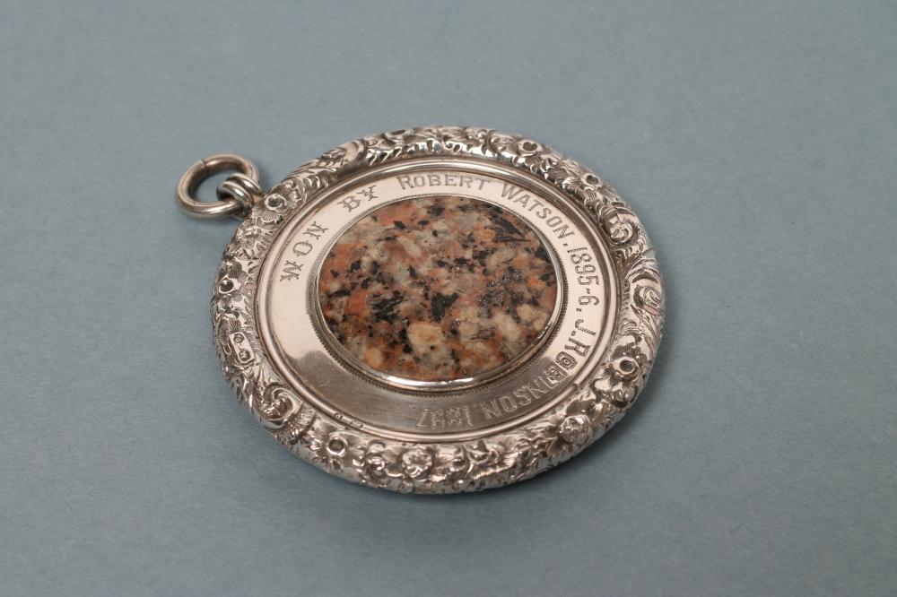 A LATE VICTORIAN SILVER CURLING MEDAL Image