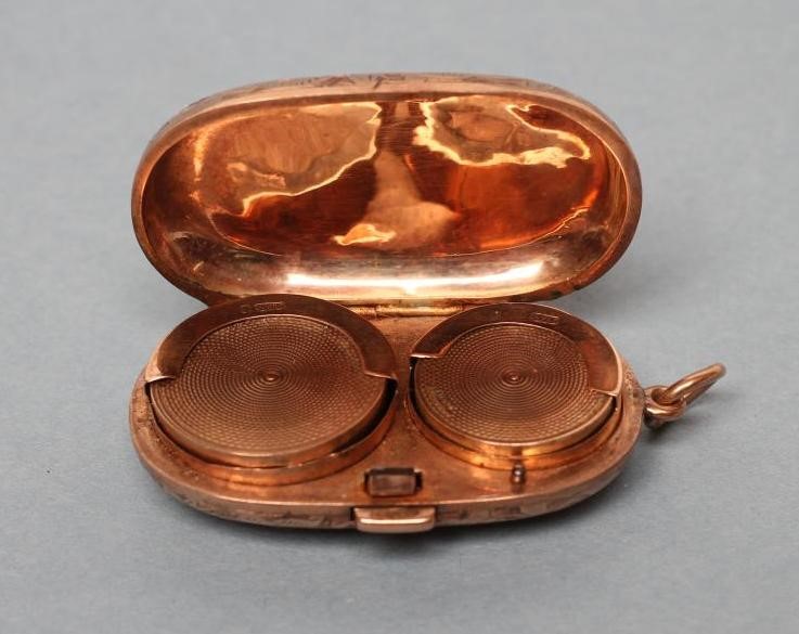 AN EDWARDIAN 9 CT. GOLD SOVEREIGN AND HALF SOVEREIGN CASE Image