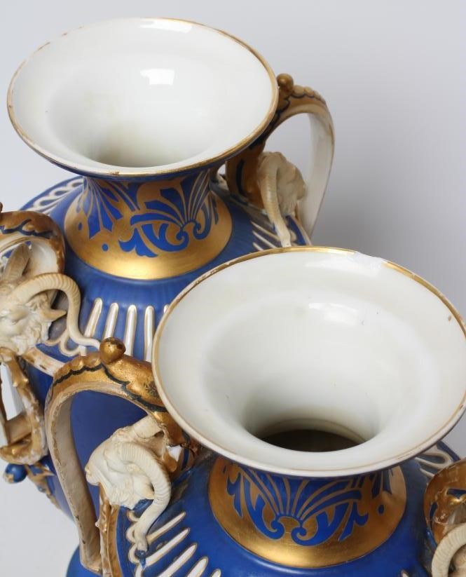 A PAIR OF FRENCH PORCELAIN URNS Image