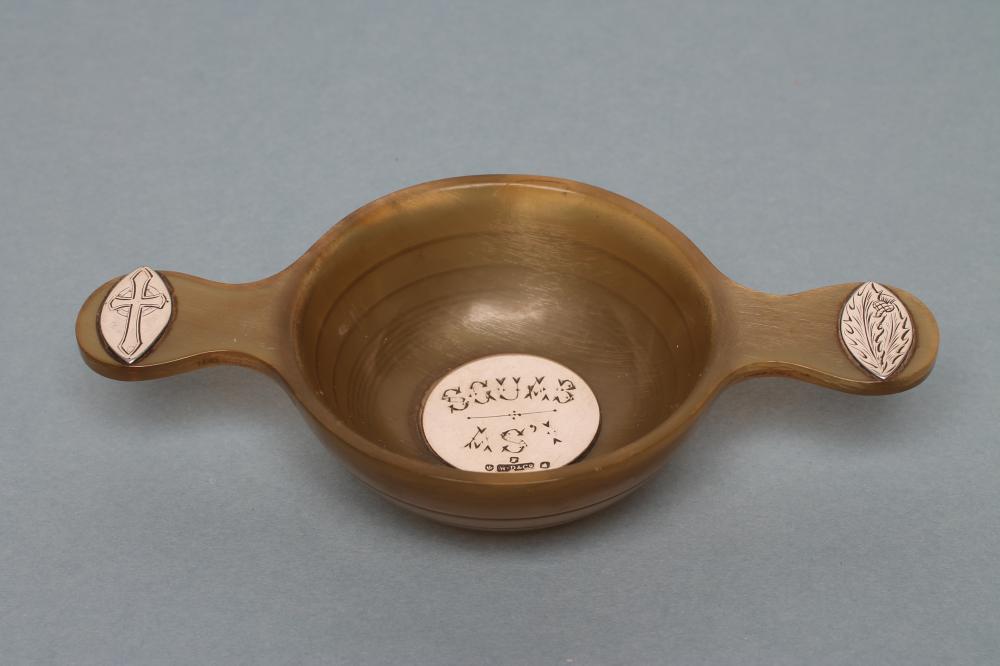 A SILVER MOUNTED TURNED AND POLISHED HORN QUAICHE Image