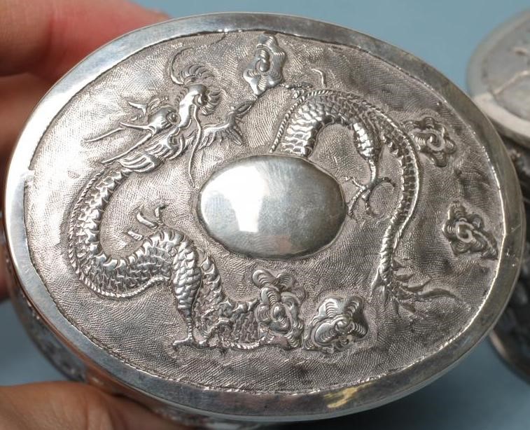 A PAIR OF CHINESE WHITE METAL BOXES Image