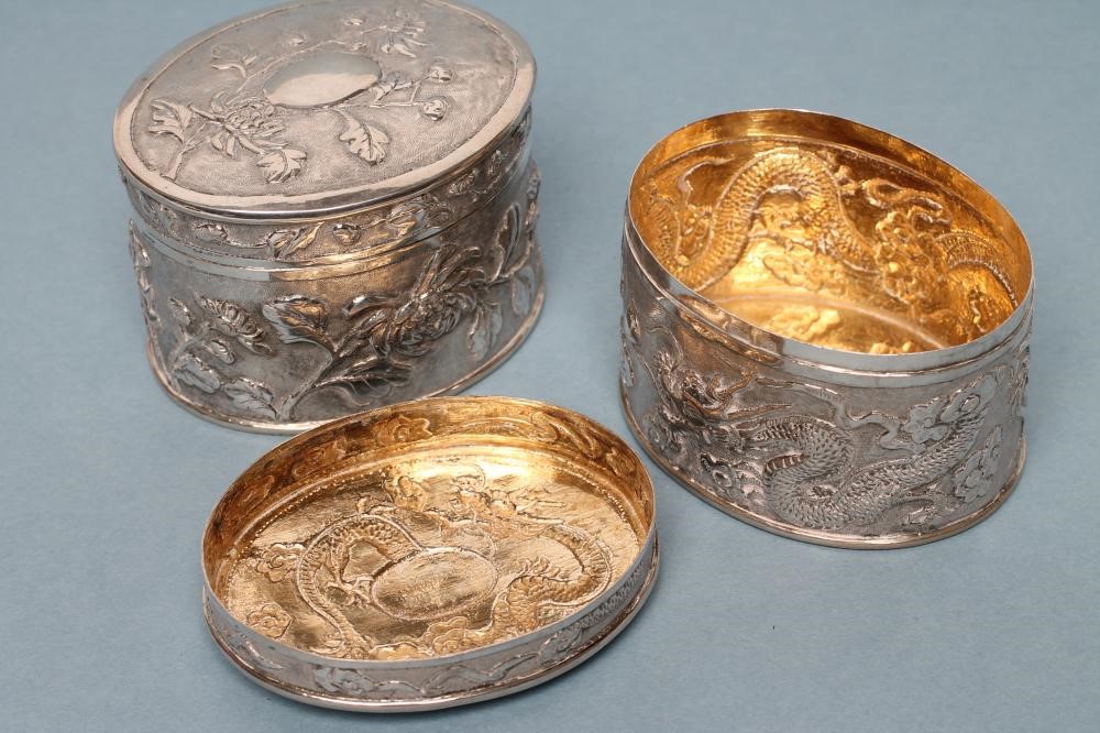 A PAIR OF CHINESE WHITE METAL BOXES Image