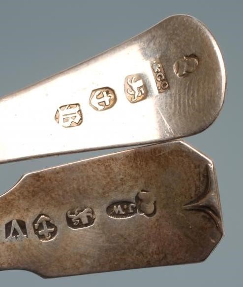 A GEORGE IV SILVER CADDY SPOON Image