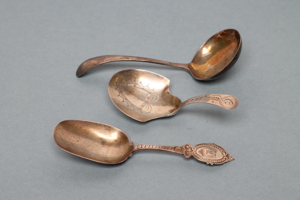 A LATE GEORGE III SILVER CADDY SPOON Image