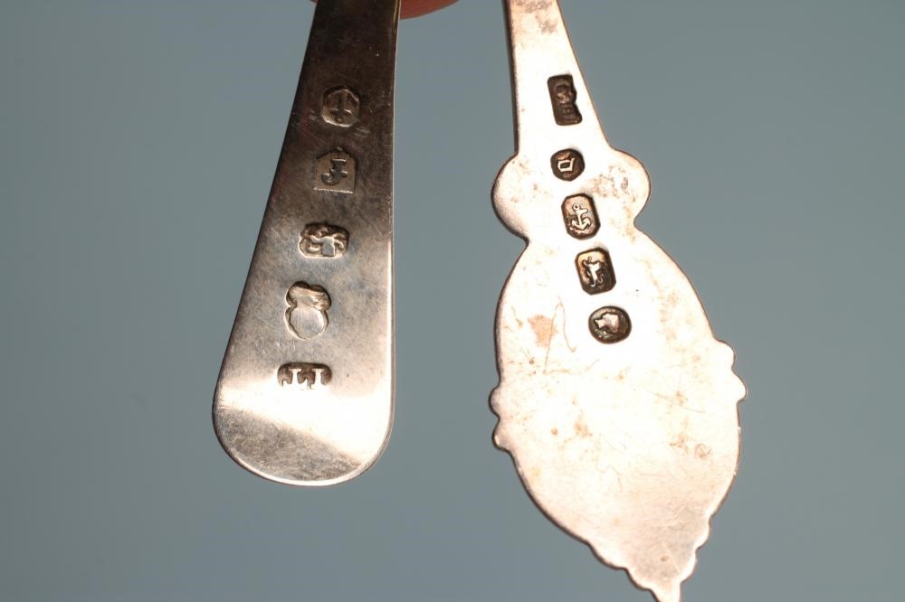 A LATE GEORGE III SILVER CADDY SPOON Image
