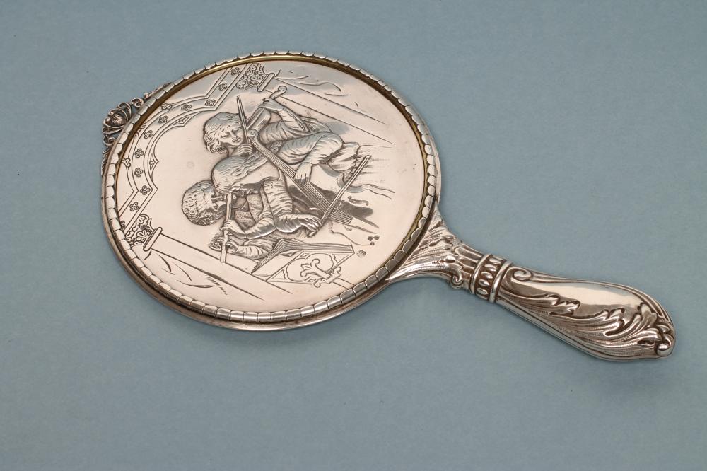 A LATE VICTORIAN SILVER HAND MIRROR Image