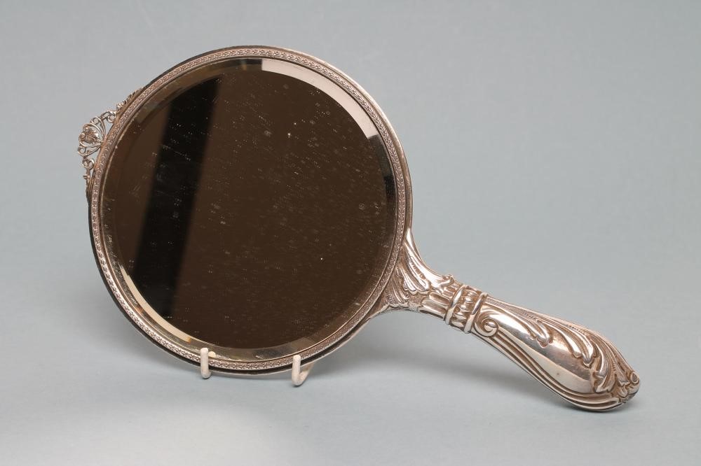 A LATE VICTORIAN SILVER HAND MIRROR Image