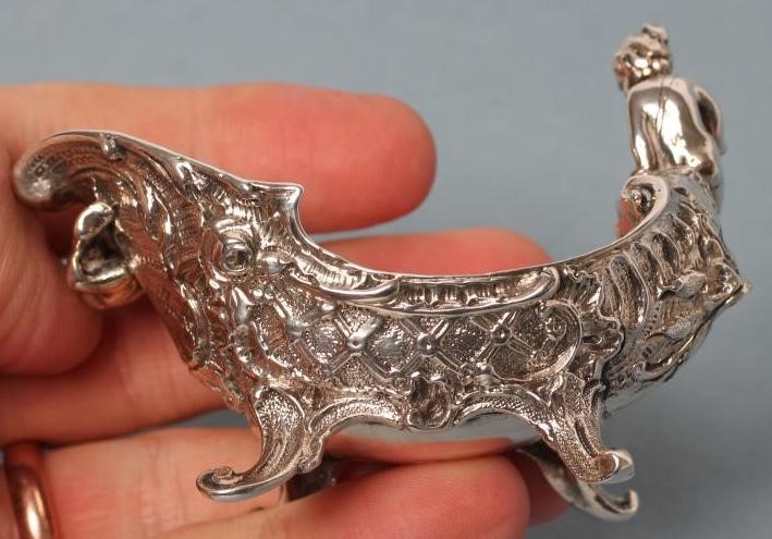 A LATE VICTORIAN SILVER BUTTER BOAT Image