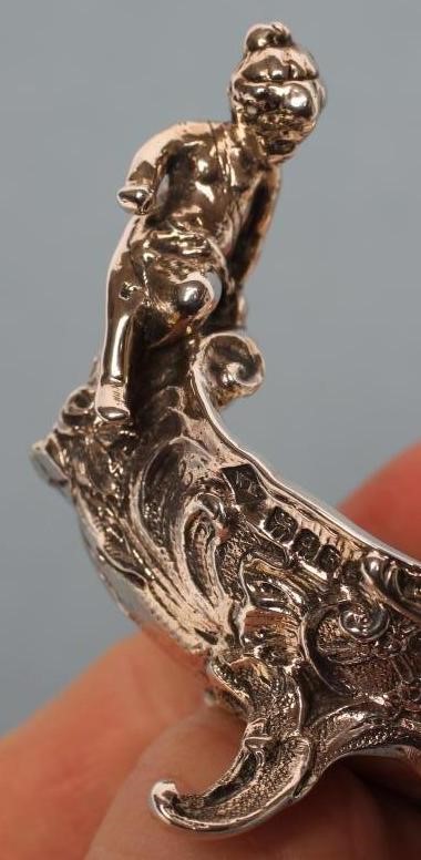 A LATE VICTORIAN SILVER BUTTER BOAT Image