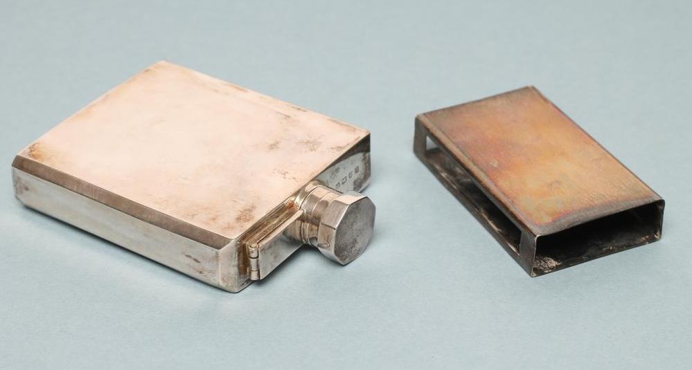 A SILVER HIP FLASK Image