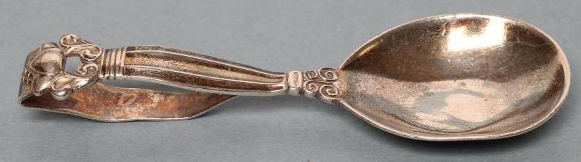 A BABY'S SILVER SPOON Image