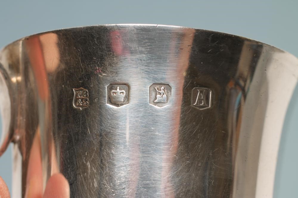 A BRITANNIA STANDARD SILVER CHRISTENING MUG Image