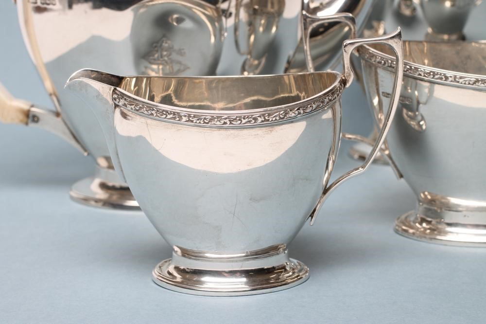 A SILVER FOUR PIECE TEA AND COFFEE SERVICE Image