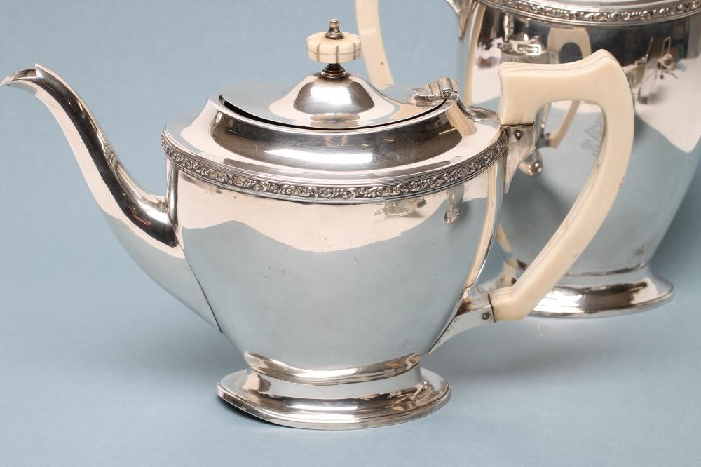 A SILVER FOUR PIECE TEA AND COFFEE SERVICE Image