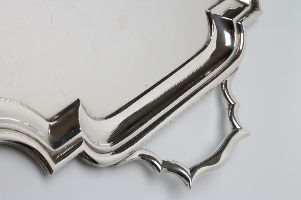 A LARGE SILVER OVAL TWO HANDLED TRAY to match the previous lot Image