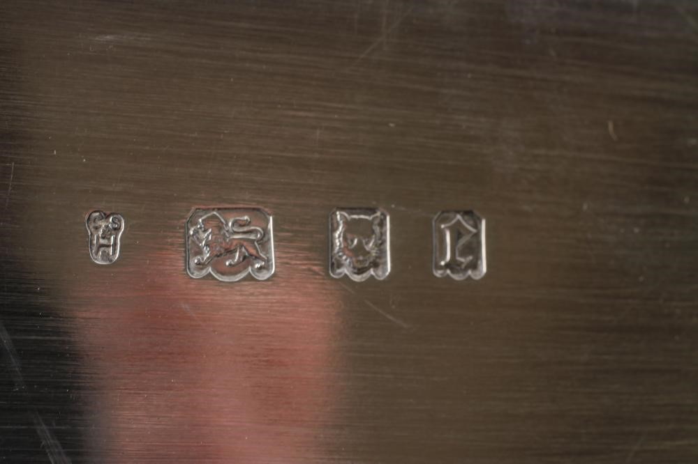 A LARGE SILVER OVAL TWO HANDLED TRAY to match the previous lot Image