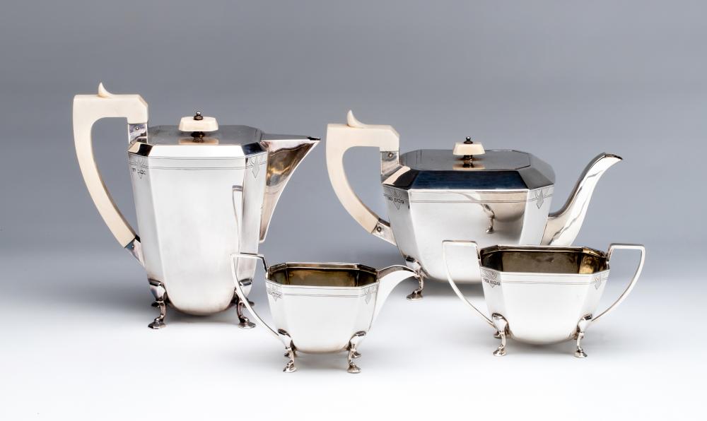 A COMPOSITE ART DECO FOUR PIECE SILVER TEA AND COFFEE SERVICE Image