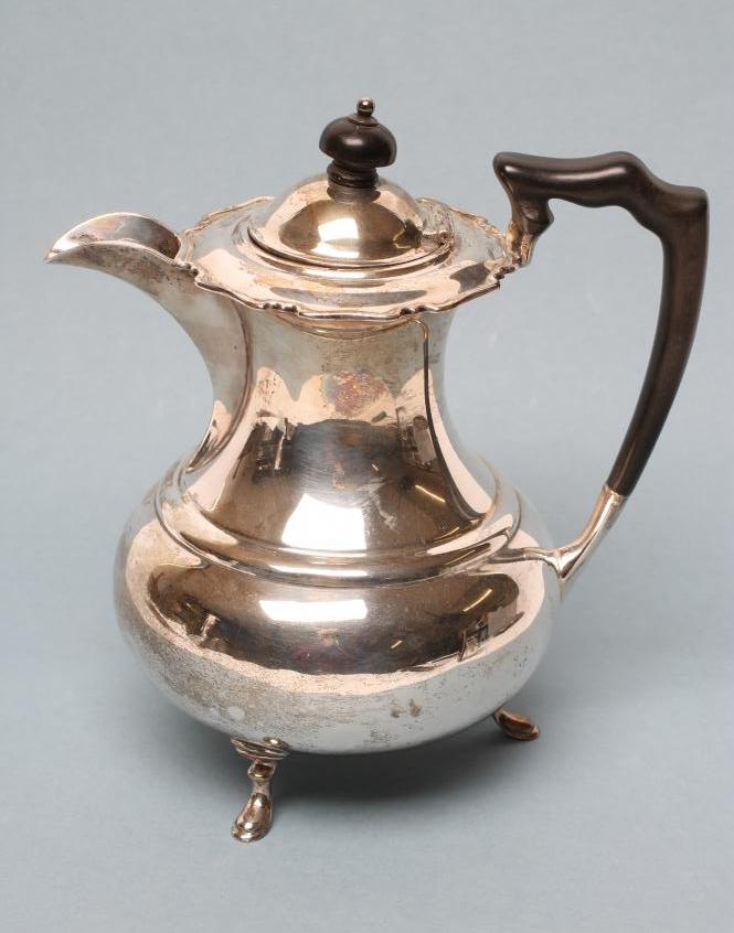 *A SILVER COFFEE POT Image