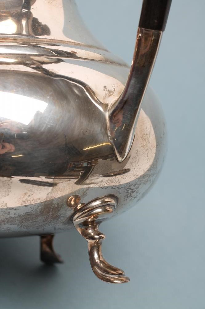 *A SILVER COFFEE POT Image