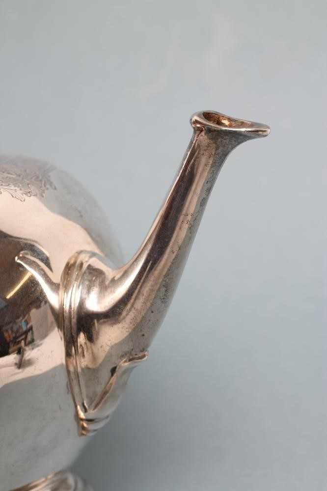 A SILVER BULLET TEAPOT Image