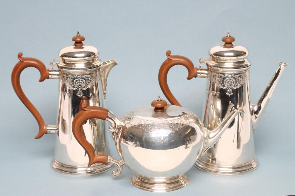 A SILVER THREE PIECE TEA AND COFFEE SET Image