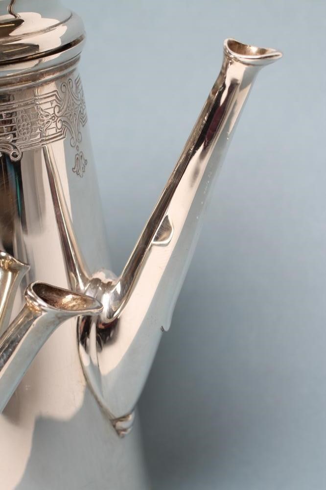 A SILVER THREE PIECE TEA AND COFFEE SET Image