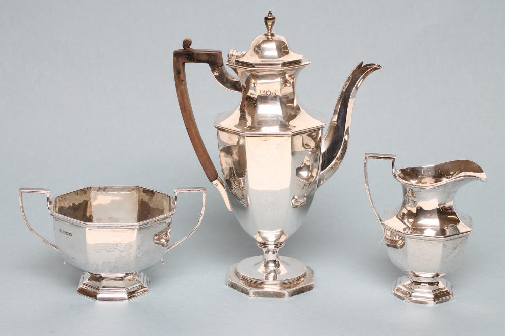 A COMPOSITE THREE PIECE SILVER COFFEE SERVICE Image