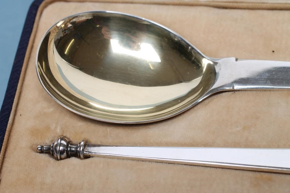 A PAIR OF SILVER PRESENTATION SPOONS Image