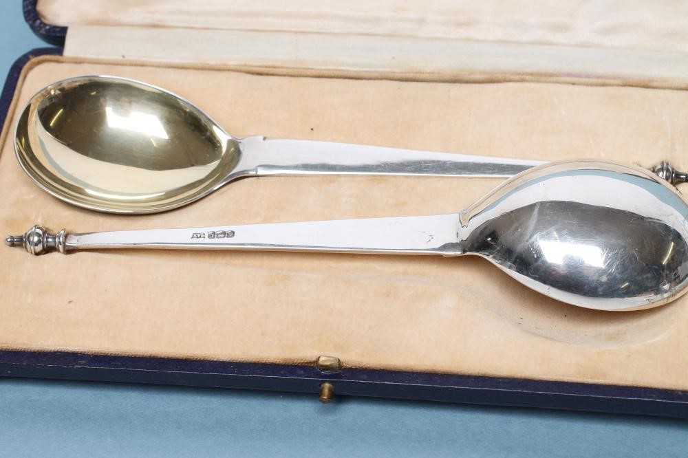 A PAIR OF SILVER PRESENTATION SPOONS Image