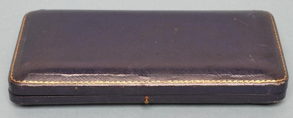 A PAIR OF SILVER PRESENTATION SPOONS Image