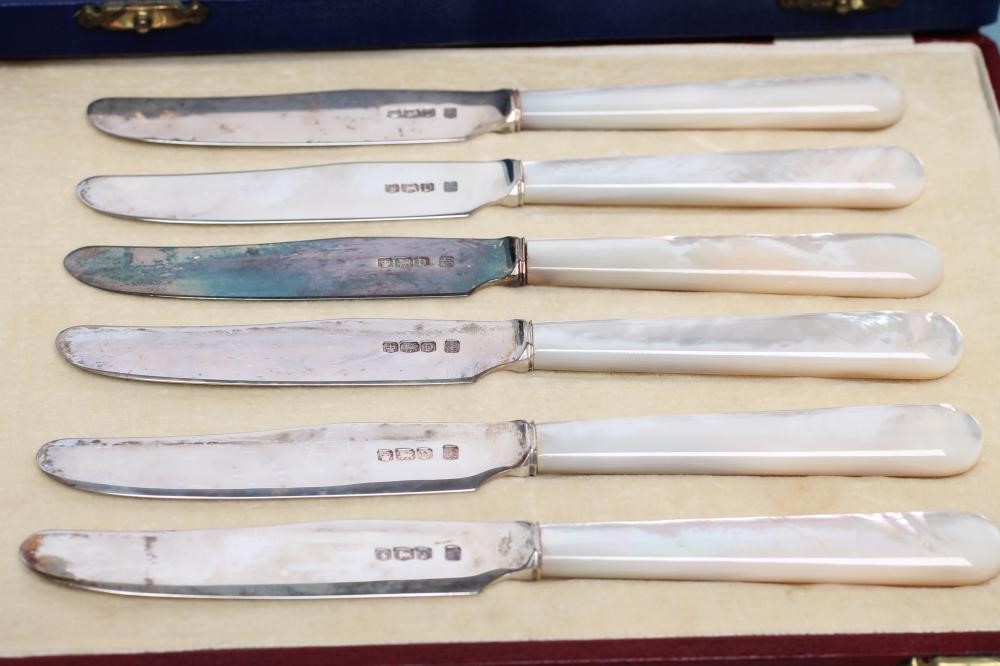 TWO SETS OF SIX SILVER TEA KNIVES Image