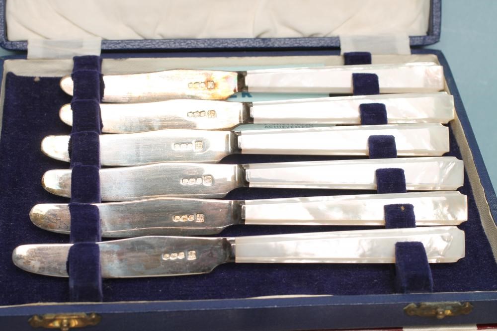 TWO SETS OF SIX SILVER TEA KNIVES Image