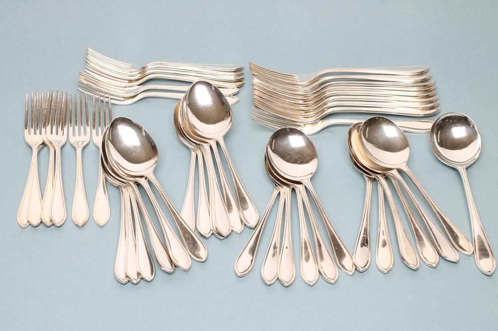 *A SILVER COMPOSITE PART TABLE SERVICE Image