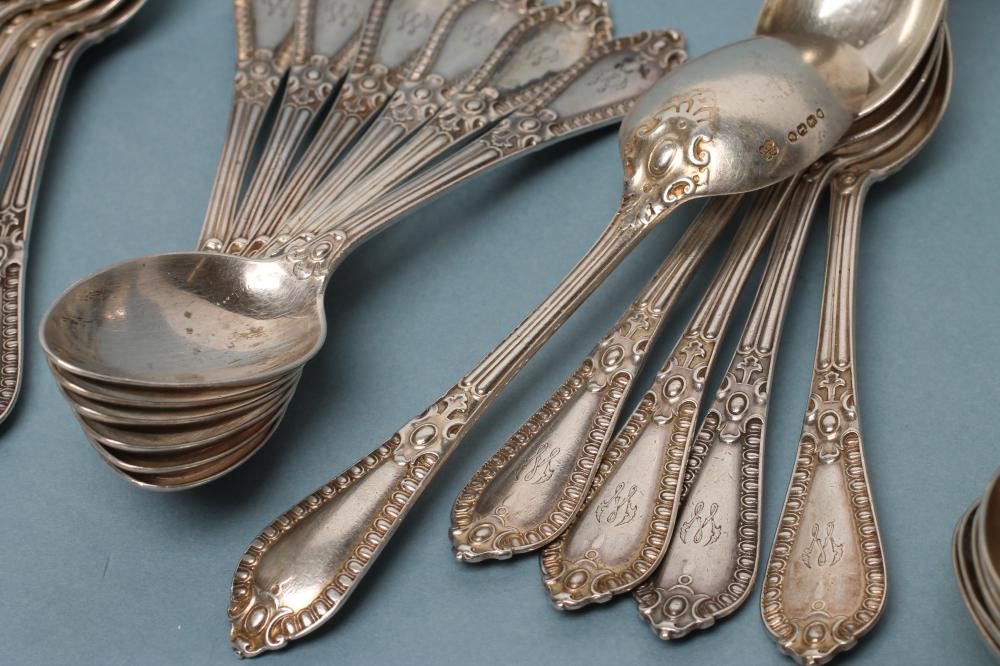 A SET OF TWENTY THREE SILVER TEASPOONS Image