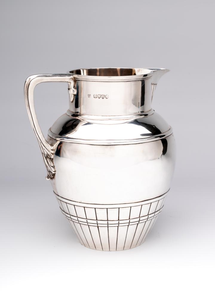 A VICTORIAN SILVER ALE JUG Image